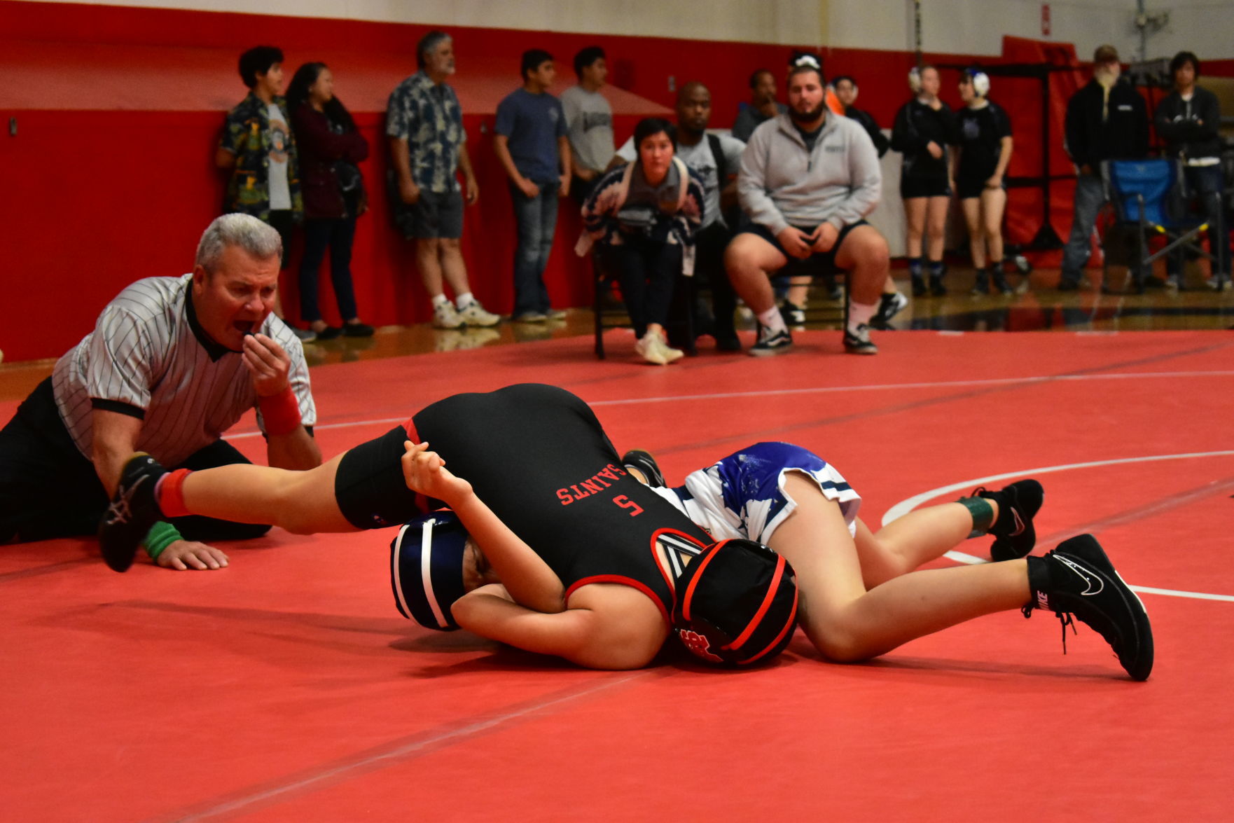 Santa Maria's Erika Sierra struggles to pin Dos Pueblos' Kimberly Silva